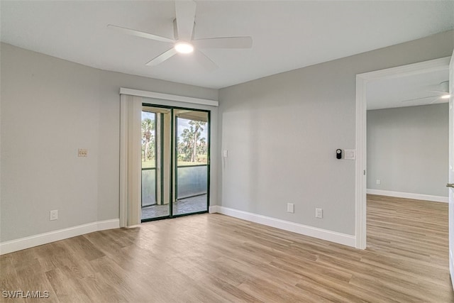 unfurnished room featuring ceiling fan and light hardwood / wood-style flooring