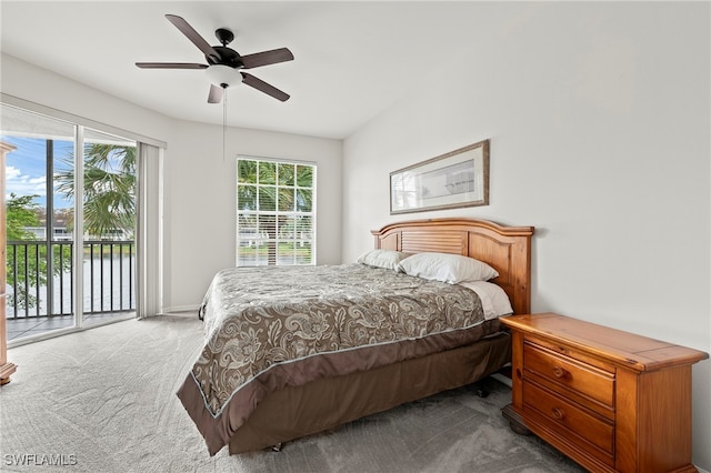 bedroom with access to outside, multiple windows, carpet, and ceiling fan