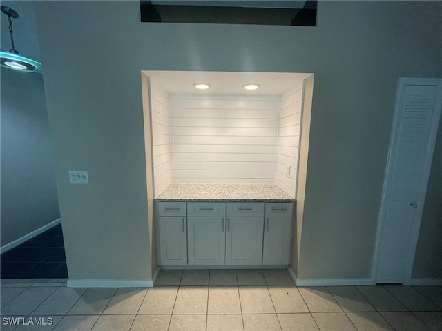 interior space featuring tile patterned flooring