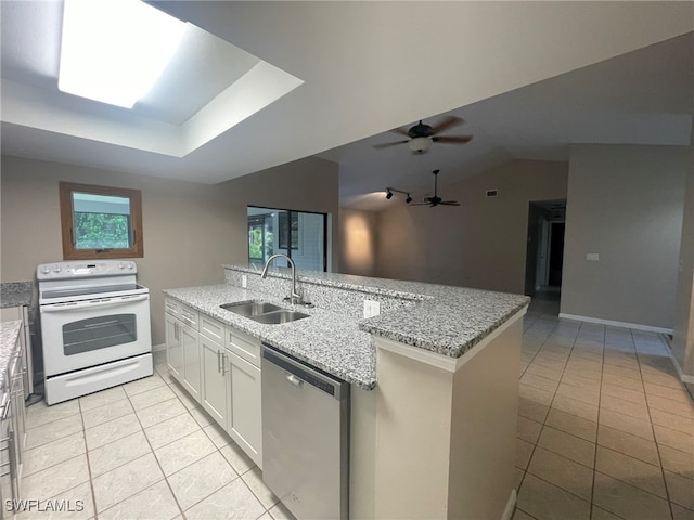 kitchen with white range with electric cooktop, light stone countertops, sink, white cabinets, and stainless steel dishwasher