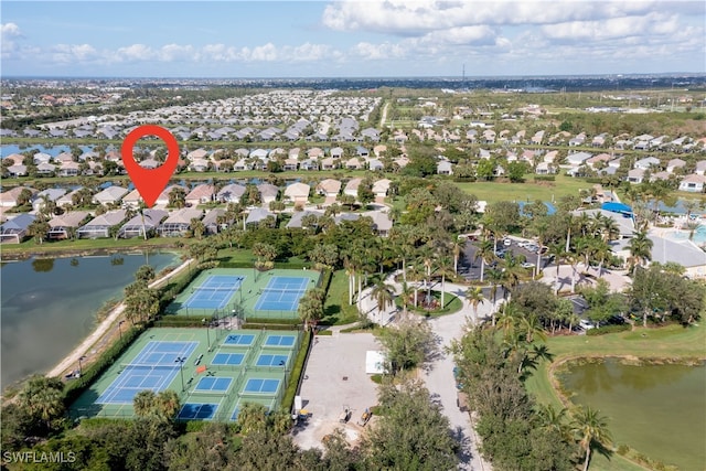 birds eye view of property featuring a water view