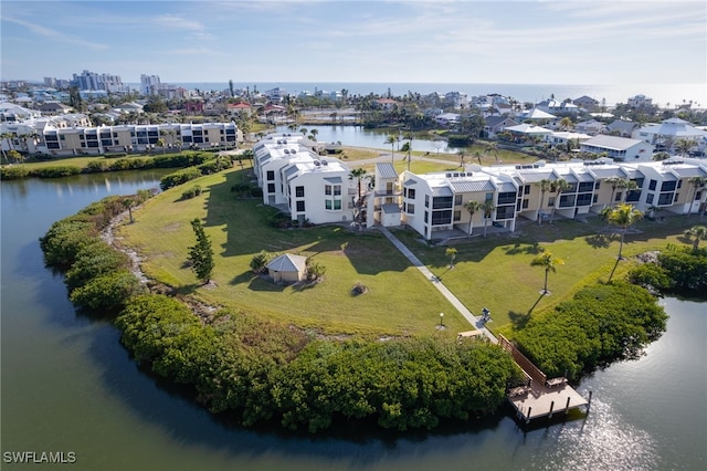 drone / aerial view with a water view