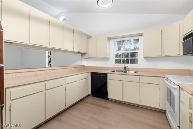 kitchen with black appliances, light wood-type flooring, sink, lofted ceiling, and cream cabinetry