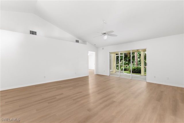 empty room featuring high vaulted ceiling, ceiling fan, and light hardwood / wood-style floors