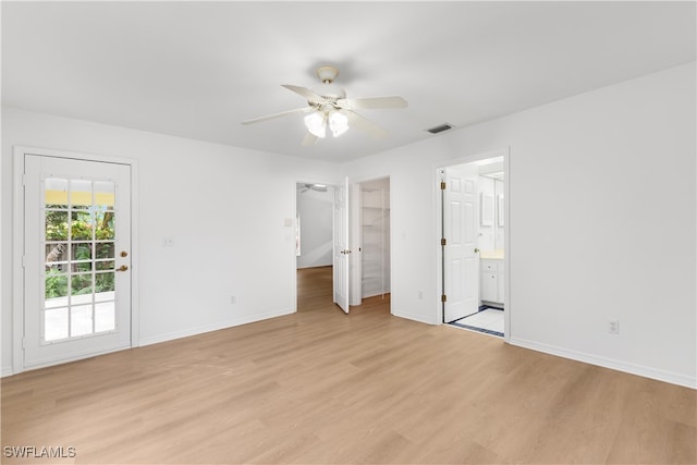 interior space featuring light wood-type flooring and ceiling fan