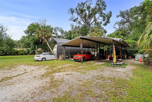 view of parking / parking lot with a lawn