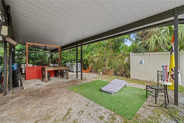 view of yard featuring a bar and a patio area