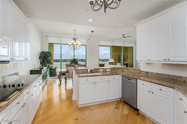 kitchen with dishwasher, kitchen peninsula, light hardwood / wood-style floors, and white cabinetry