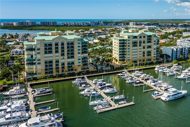 birds eye view of property with a water view