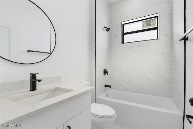 full bathroom with vanity, toilet, and tiled shower / bath