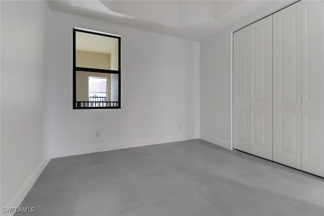 unfurnished bedroom featuring a closet