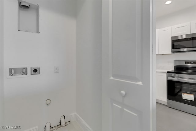 laundry room with hookup for a gas dryer, washer hookup, and hookup for an electric dryer