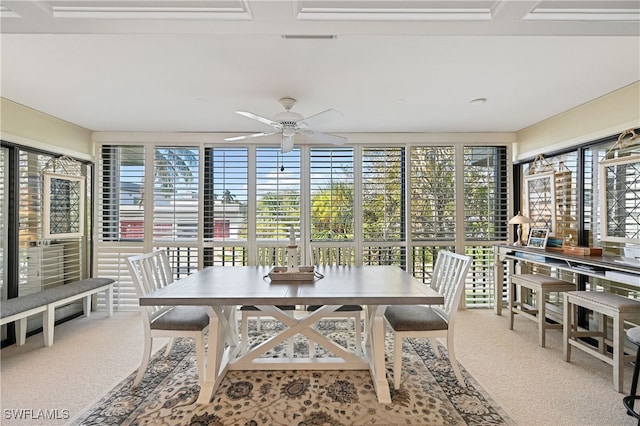 sunroom / solarium with ceiling fan