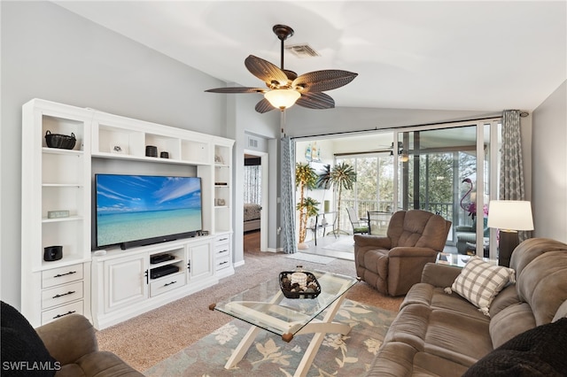 carpeted living room with lofted ceiling and ceiling fan