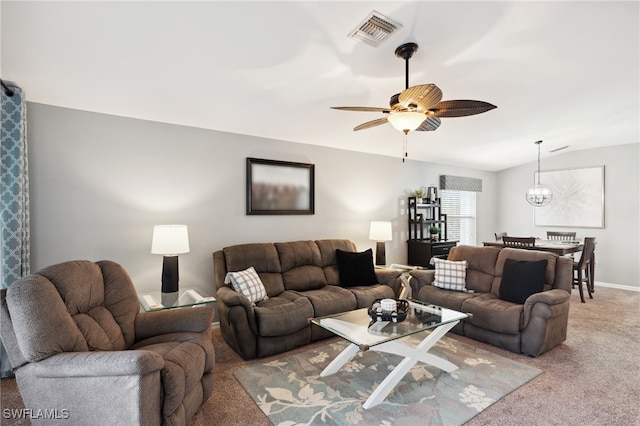 living room featuring carpet floors and ceiling fan