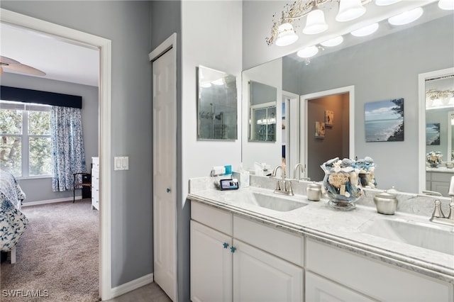 bathroom featuring vanity and ceiling fan