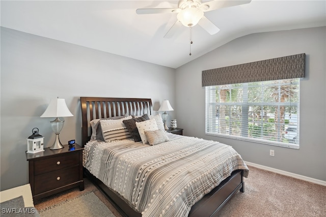 carpeted bedroom featuring vaulted ceiling and ceiling fan