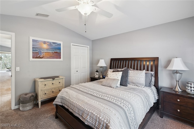 bedroom featuring carpet floors, ceiling fan, lofted ceiling, and a closet