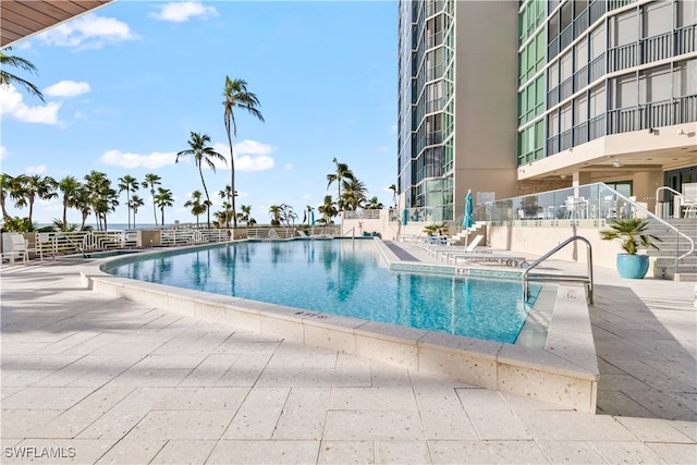 view of pool featuring a patio