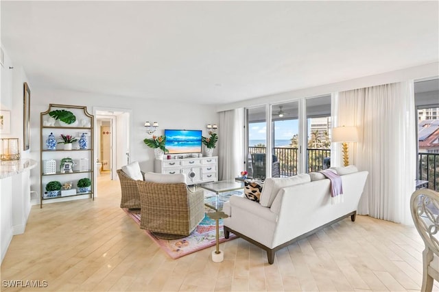 living area featuring light wood-style flooring
