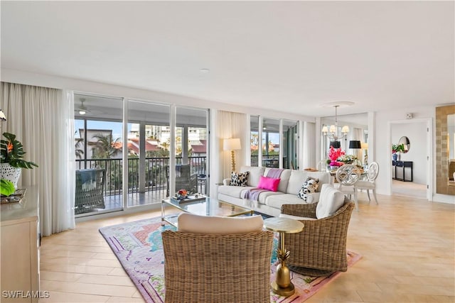 living area with a notable chandelier