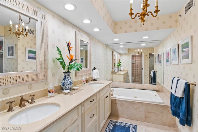 bathroom featuring vanity, tile patterned floors, plus walk in shower, and a notable chandelier