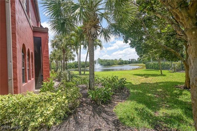 view of yard with a water view