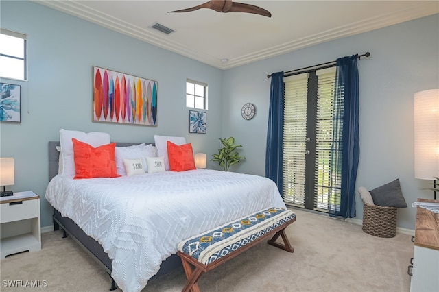 bedroom with ceiling fan and light colored carpet