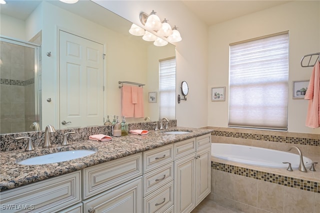 bathroom with plus walk in shower and vanity