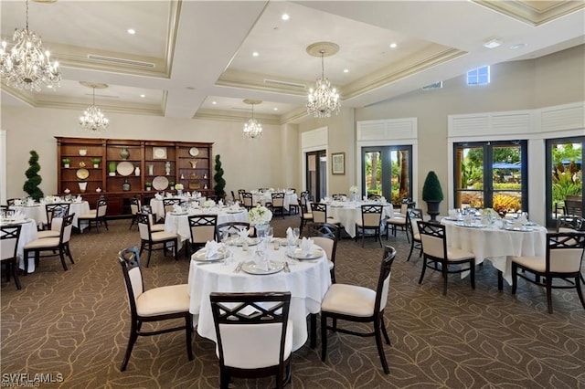 dining space with beam ceiling, french doors, coffered ceiling, crown molding, and a towering ceiling