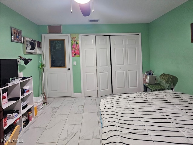 bedroom with a closet and ceiling fan