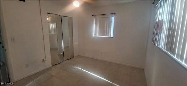 unfurnished bedroom featuring a closet