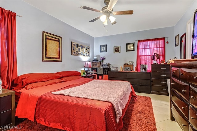 bedroom with light tile patterned flooring and ceiling fan