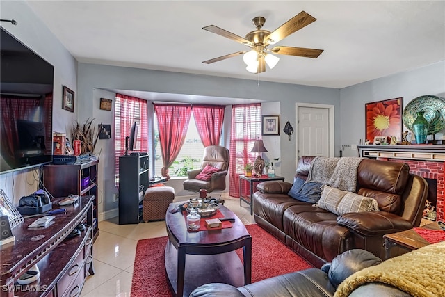 living room with ceiling fan and light tile patterned floors