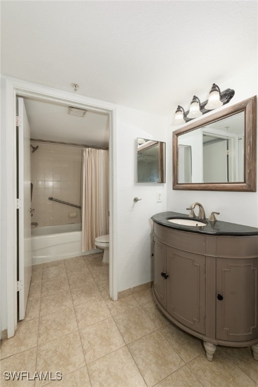 full bathroom with tile patterned flooring, vanity, toilet, and shower / tub combo