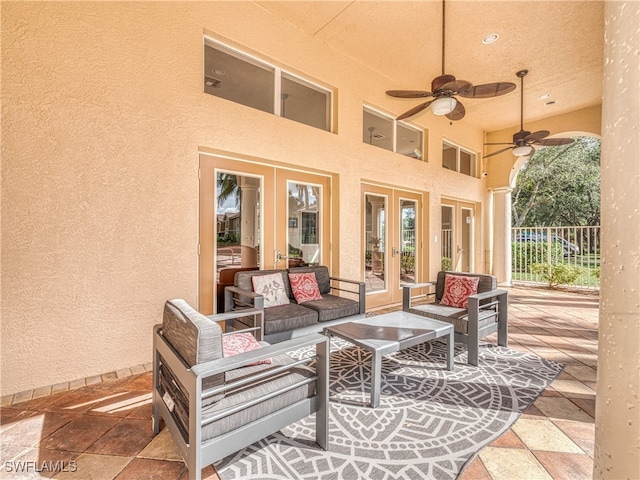 view of patio / terrace with ceiling fan, outdoor lounge area, and french doors