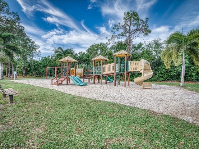 view of jungle gym with a yard