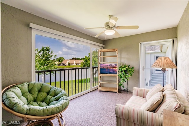 interior space with ceiling fan and a healthy amount of sunlight