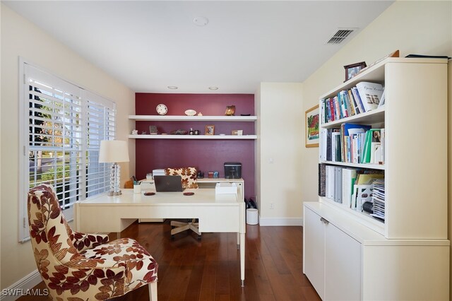 office space with dark hardwood / wood-style flooring