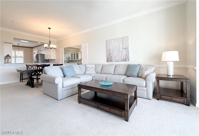 carpeted living room with crown molding and an inviting chandelier