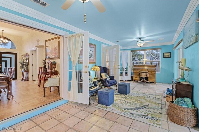 interior space with french doors and ceiling fan