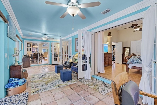 sunroom featuring french doors