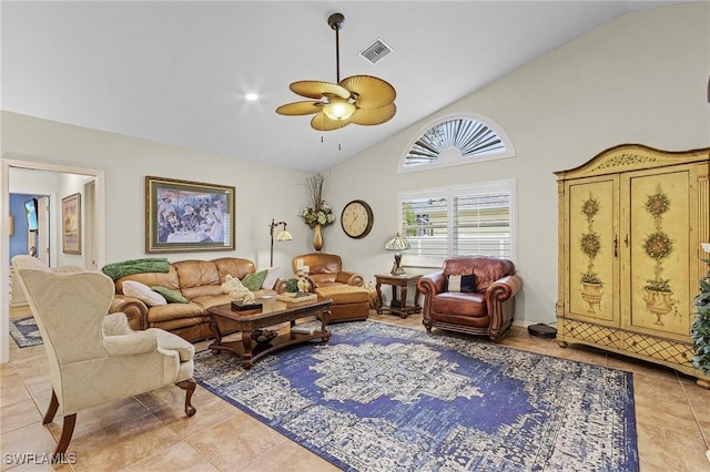 living room with light tile patterned floors, high vaulted ceiling, and ceiling fan