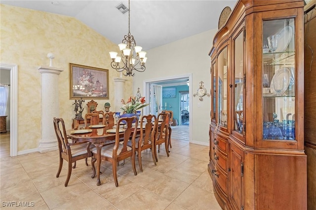 dining space featuring vaulted ceiling, light tile patterned floors, and an inviting chandelier