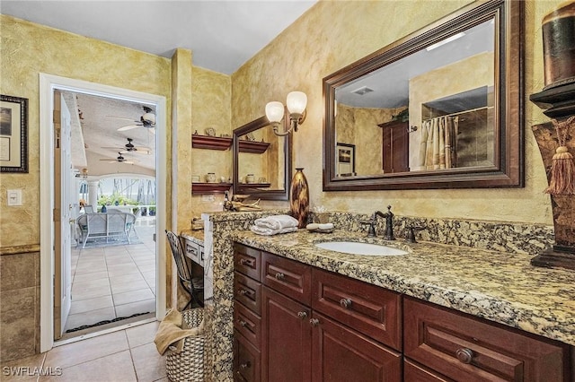 bathroom with vanity, tile patterned floors, and ceiling fan