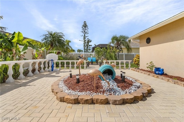 surrounding community with a patio