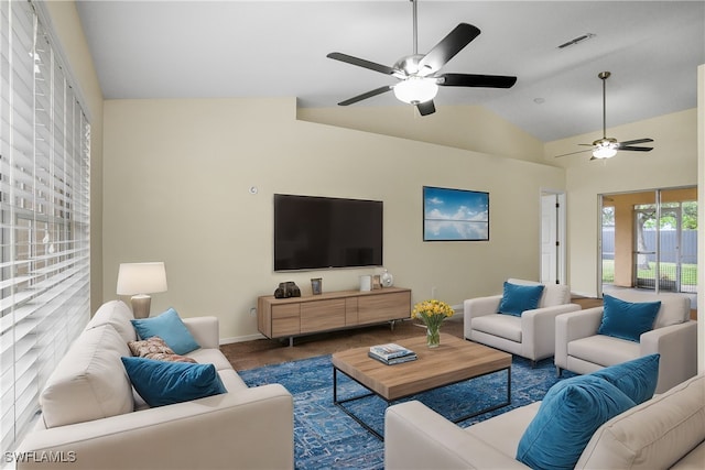 living room with vaulted ceiling and ceiling fan