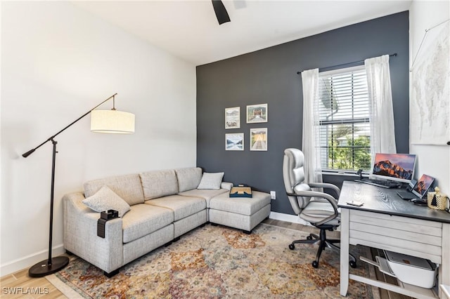 office space featuring hardwood / wood-style flooring and ceiling fan