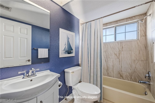 full bathroom featuring shower / tub combo with curtain, vanity, and toilet