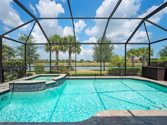 view of pool with a pool with connected hot tub, a water view, and a lanai